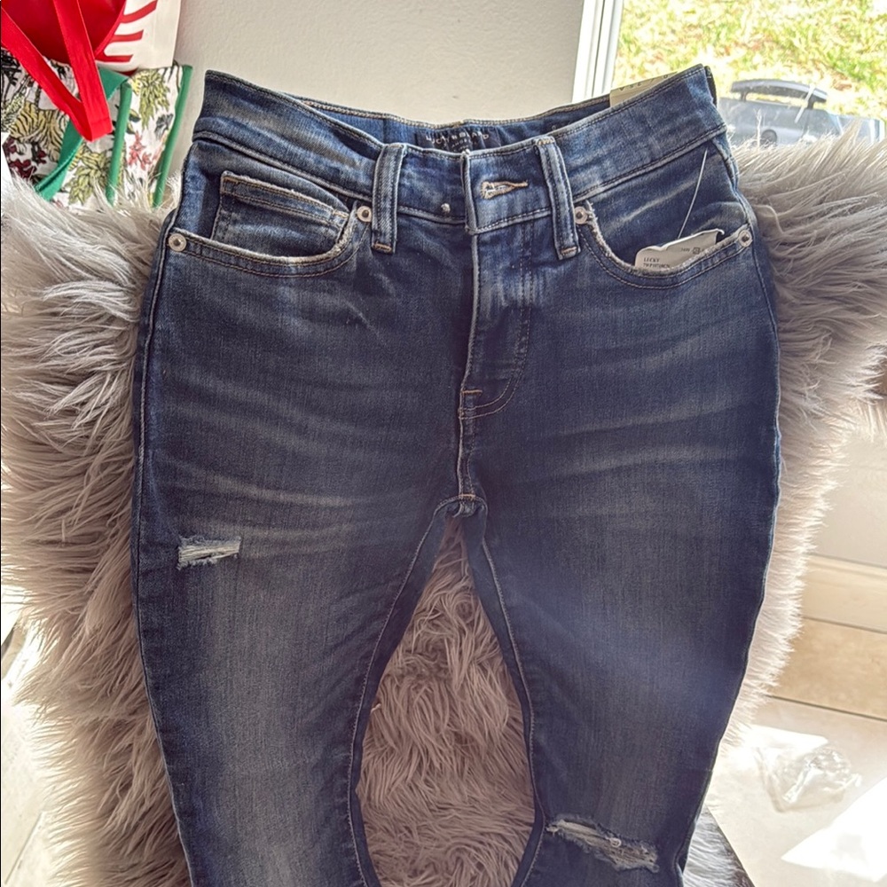 Blue Skinny Jeans with Distressed Details
